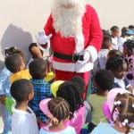 Santa giving the universal high five to the kids. 150x150 photo Santa giving the universal high five to the kids. 150x150 Potter Elementary School