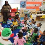 更兴奋的孩子们互动智慧h Santa and open their gifts. 2 150x150 Potter Elementary School