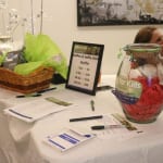 This is the welcome table. 150x150 Wigs for Kids & Westchase Charitable Foundation